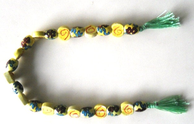 Supplies , Beads - vintage yellow ceramic beads,Pottery beads, string measuring 16 " long. Handmade .