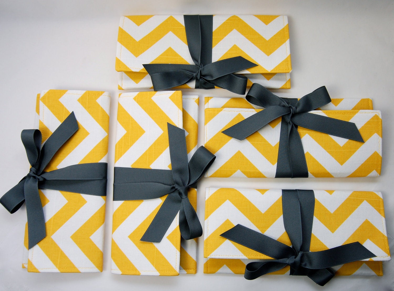 Yellow chevron bridesmaid clutches with gray. Custom colors available.