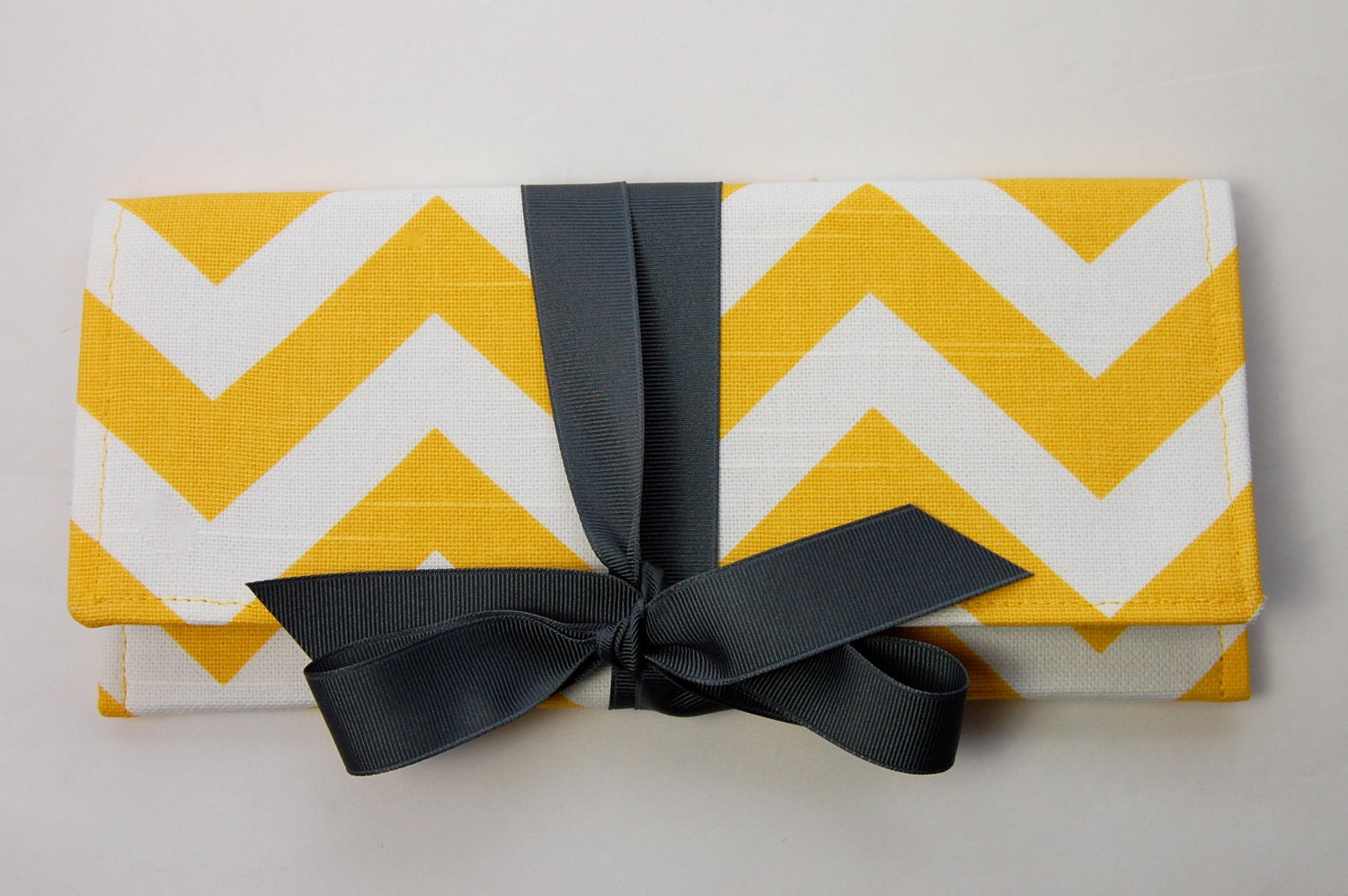 Yellow chevron bridesmaid clutches with gray. Custom colors available.