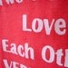 When Two People Love Each Other Very Much Onesie size 6-12mos (coral/white)