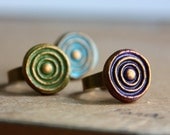 Cold clay whirl texture on adjustable brass ring