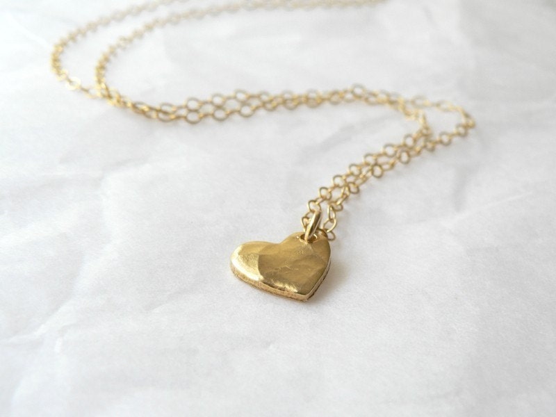 tiny gold heart necklace - the smallest hammered heart pendant necklace - delicate gold jewelry by windowsill