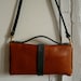 honey and slate clutch