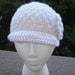 Crochet Newsboy Hat Pattern. Make a Beanie, a Newsboy Hat or Cap, and a Flower all in one design.