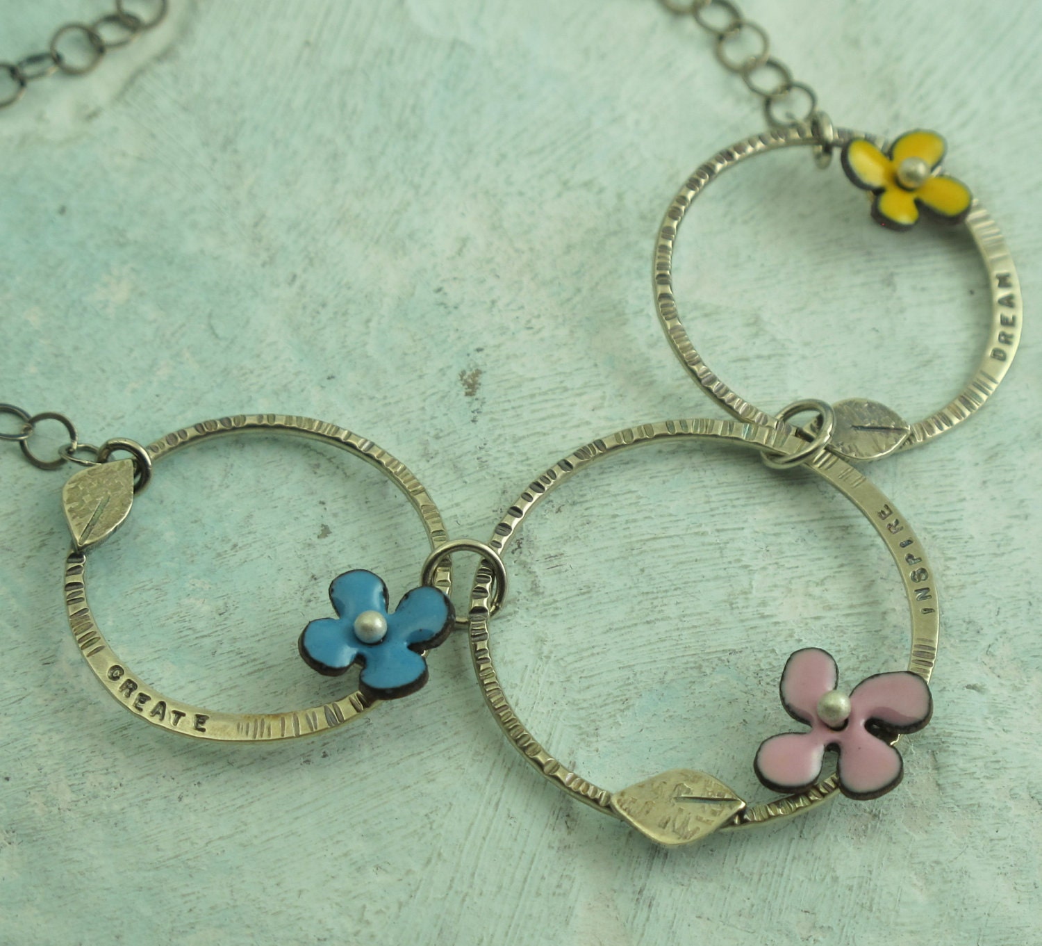 Create Inspire Dream - sterling silver and enamel flower necklace by Kathryn Riechert