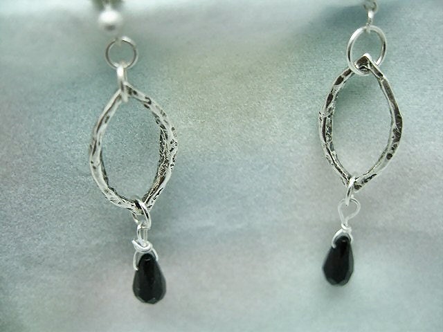 Black Oval Dangle Earrings by Diana
