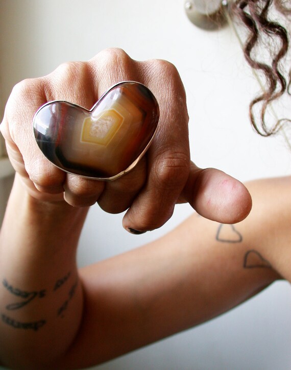 THE ring worn by Ms Esperanza Spalding on stage at the ACADEMY awards, 2012 - massive and fabulous agate heart knuckle ring
