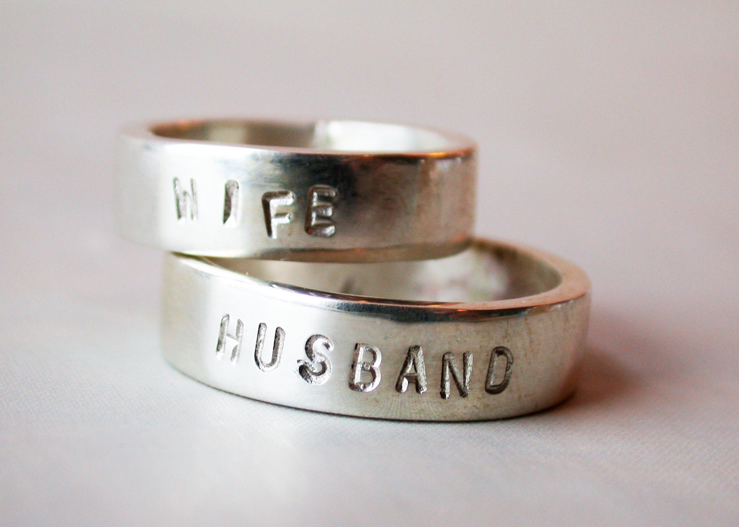 husband and wife, sterling silver wedding band pair