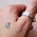husband and wife, sterling silver wedding band pair