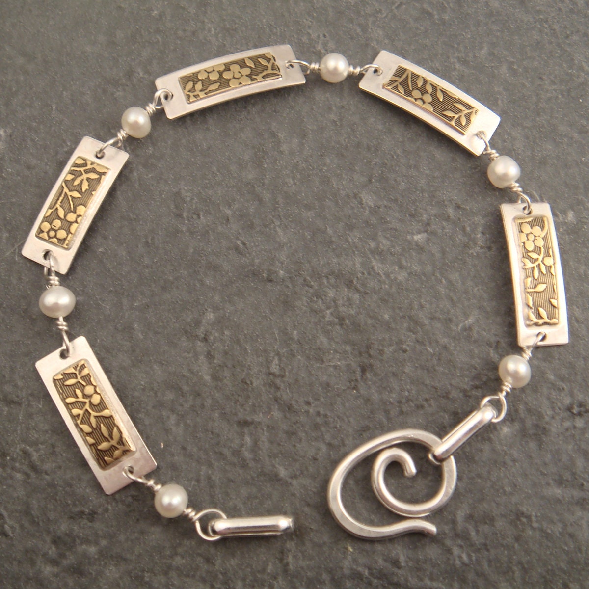 Silver and Brass Rectangular Bracelet with Garnet Beads