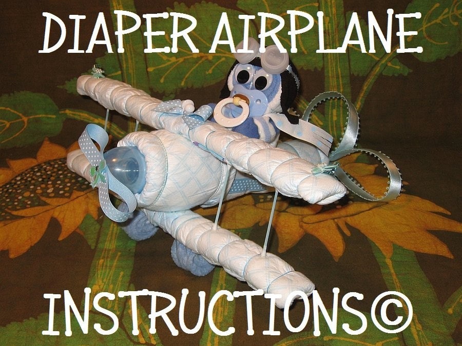 DIAPER AIRPLANE e-book INSTRUCTIONS. Completely made from diapers, washcloths, bottle, etc. Easy 2 follow guide.