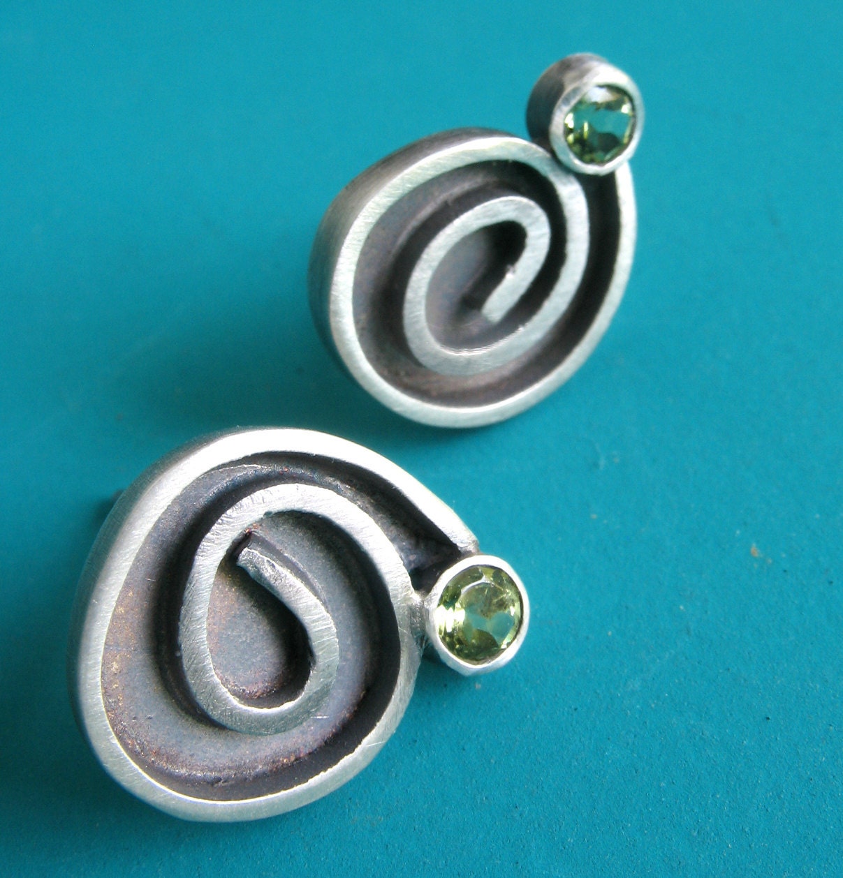 Gestural Sterling Spiral Earrings With Faceted Peridot