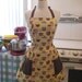 Vintage Inspired Yellow Cupcake with Brown Contrast Apron
