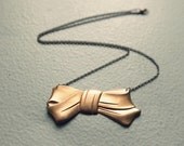 brass bow necklace in vintage statement gold