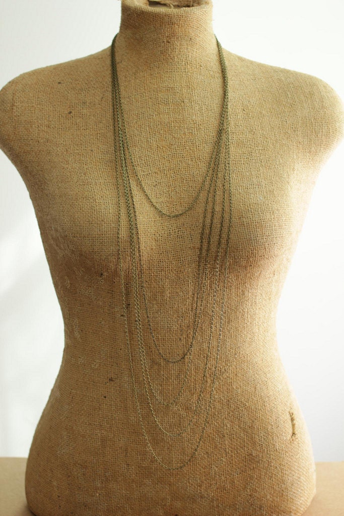long minimal necklace with multi layered chains