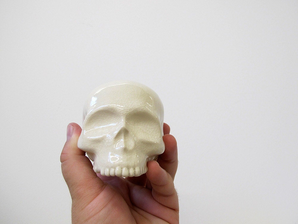 Human Skull ceramic halloween decoration in a stunning clear crackle glaze for display
