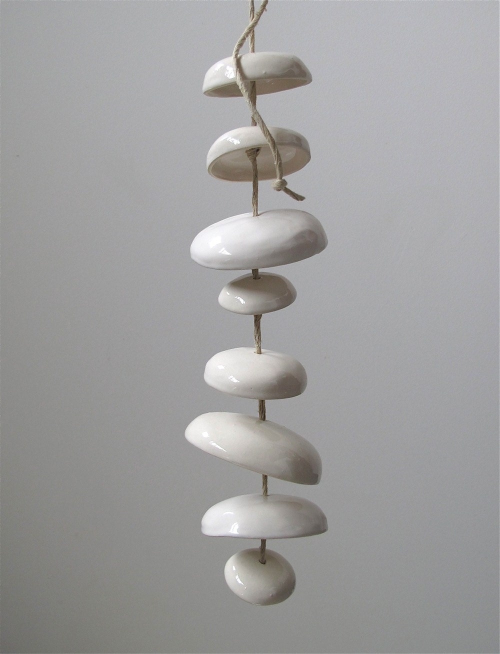 Mudpuppy Moon chimes organic hanging disc bells garden sculpture in Gloss White - Half Stack