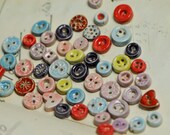 50 tiny buttons reduced