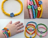 Little Girls Dora the Explorer inspired Bracelet Yellow beads blue flower Great Stocking Stuffer for Toddlers Preschoolers Kids and Children