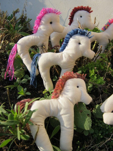 A  herd of 12 Paint your own Horses