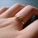 ahoy . gold . anchor stacking ring . size 7