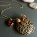 CLEARANCE . scarlet ribbon . filigree locket necklace