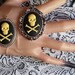 Hazardous Yellow and Black Skull and Crossbone Cameo Pendant