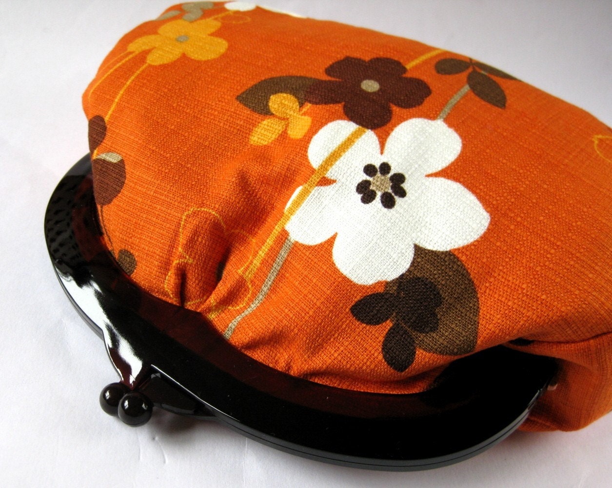 plastic frame clutch - retro flower vines on orange