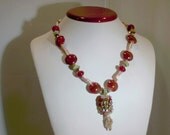 Lampwork and Pearls Handcrafted Burgandy, Green Necklace Made during Hurricane Ike ... Please Help Victims