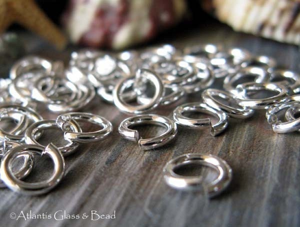 18 gauge hand cut sterling silver round jump rings. Artisan handmade. AGB quality circle jewelry findings 6mm 25 pieces. Made to order.