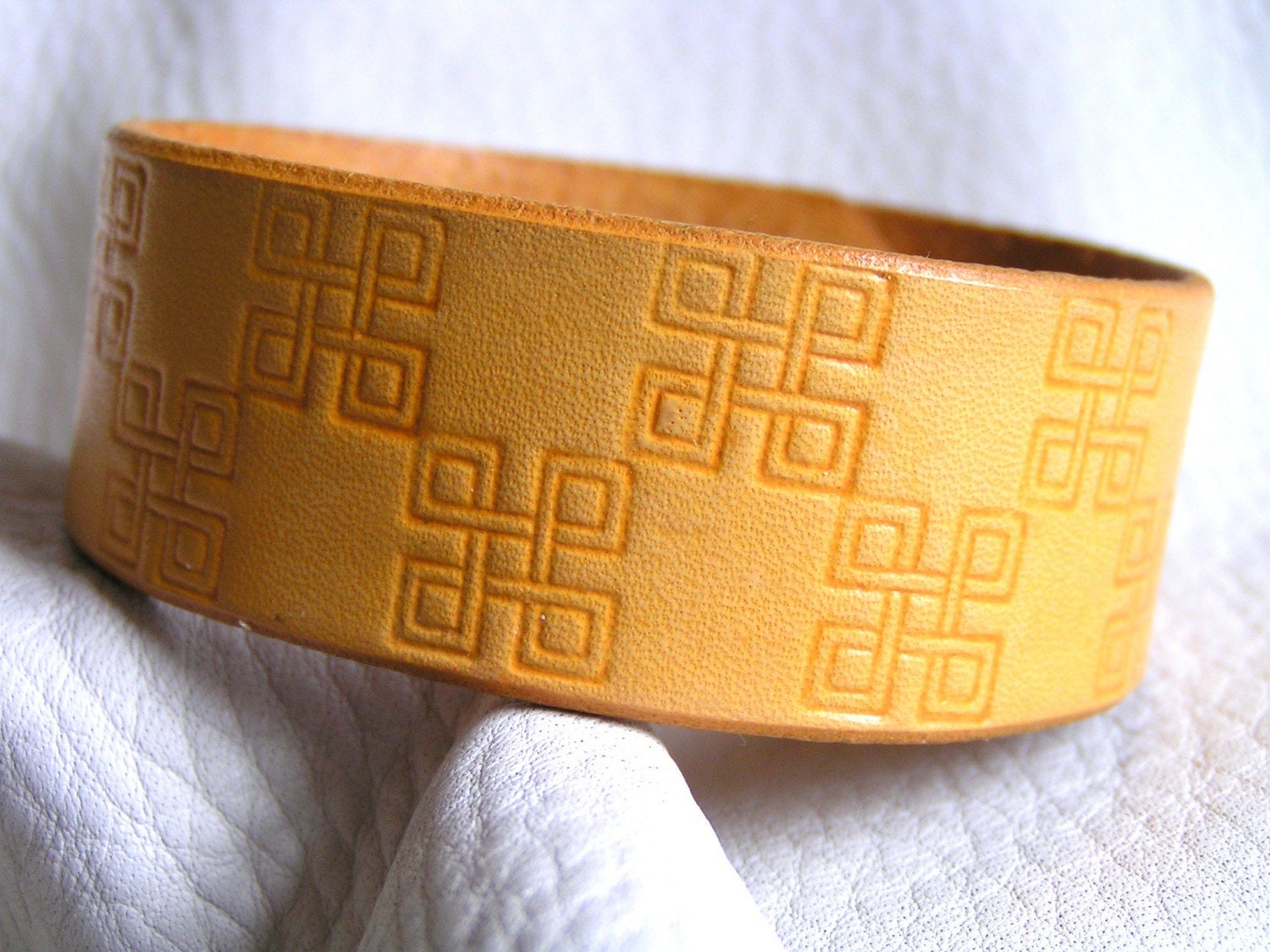 Yellow square interlace cuff