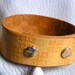 Yellow square interlace cuff
