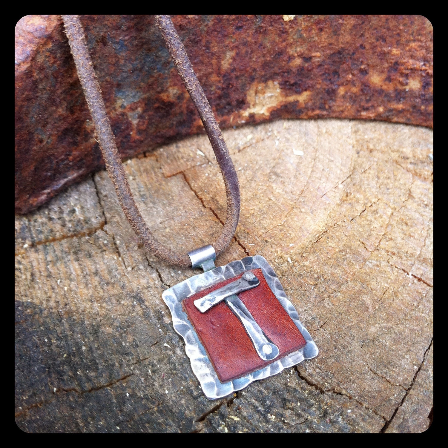 Silver & leather necklace.