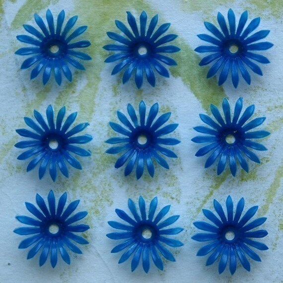 9 vintage soft plastic mini flowers, dark blue