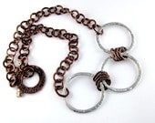 Sterling Silver Copper Necklace. Hammered rings.  Mixed metal. Design by  Fashion  Brand Faina.