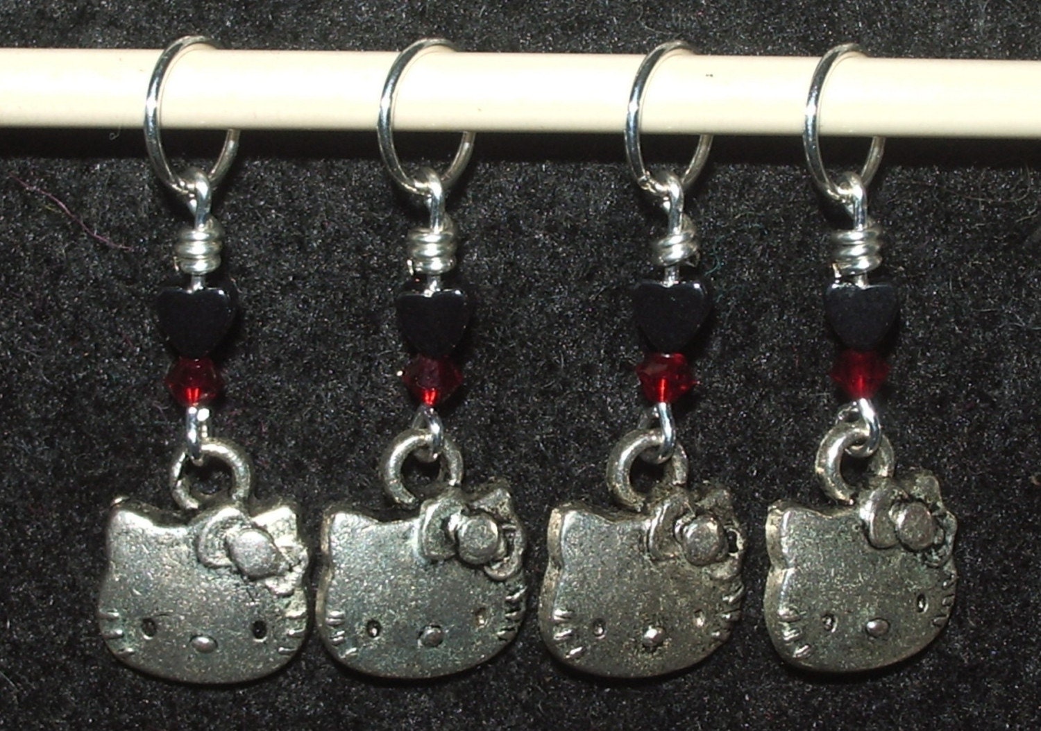 Hello Kitty stitch markers with siam red swarovski crystal and hematite hearts - set of four