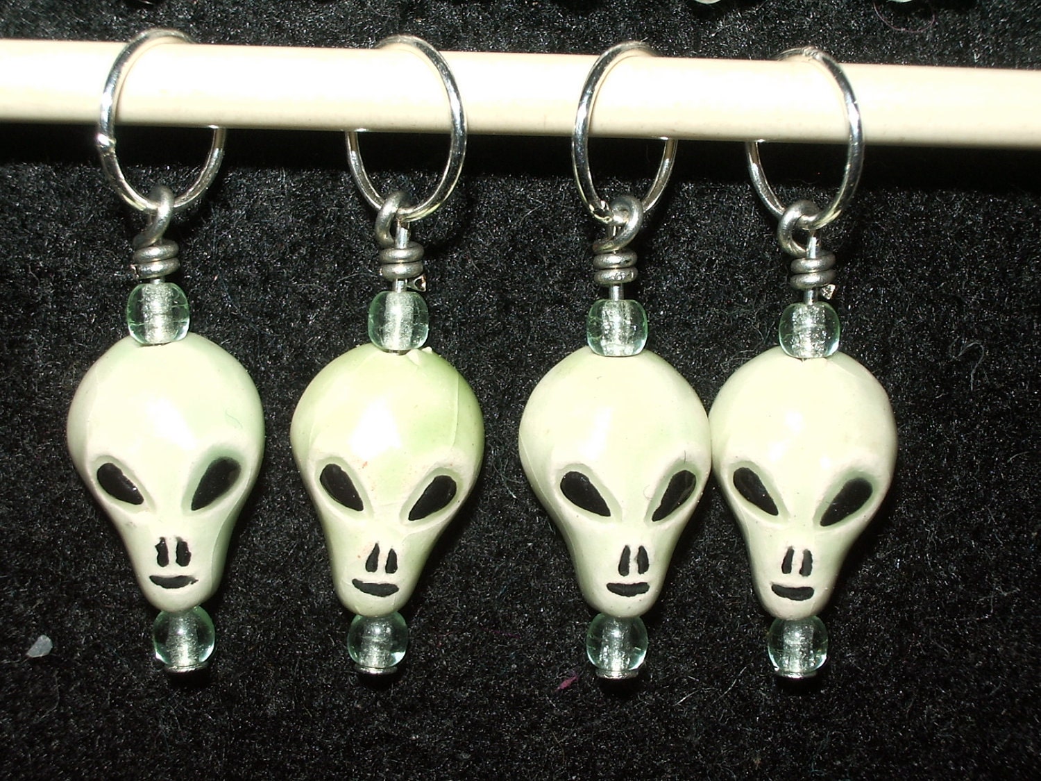 Ceramic alien stitch markers with pale green glass druk beads - set of four