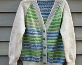 Girl, size 6/8, Cardigan sweater and hat, white and blue/green variegated.