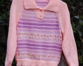Girl, size 8, Peach/mauve striped sweater.