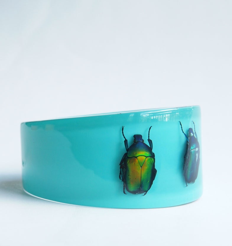 Blue lucite bracelet with real beetles