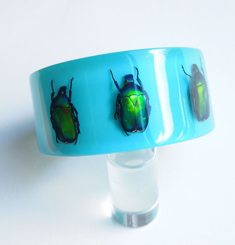 Blue lucite bracelet with real beetles
