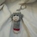 Sock Monkey chapstick cozy keychain - grey with red band
