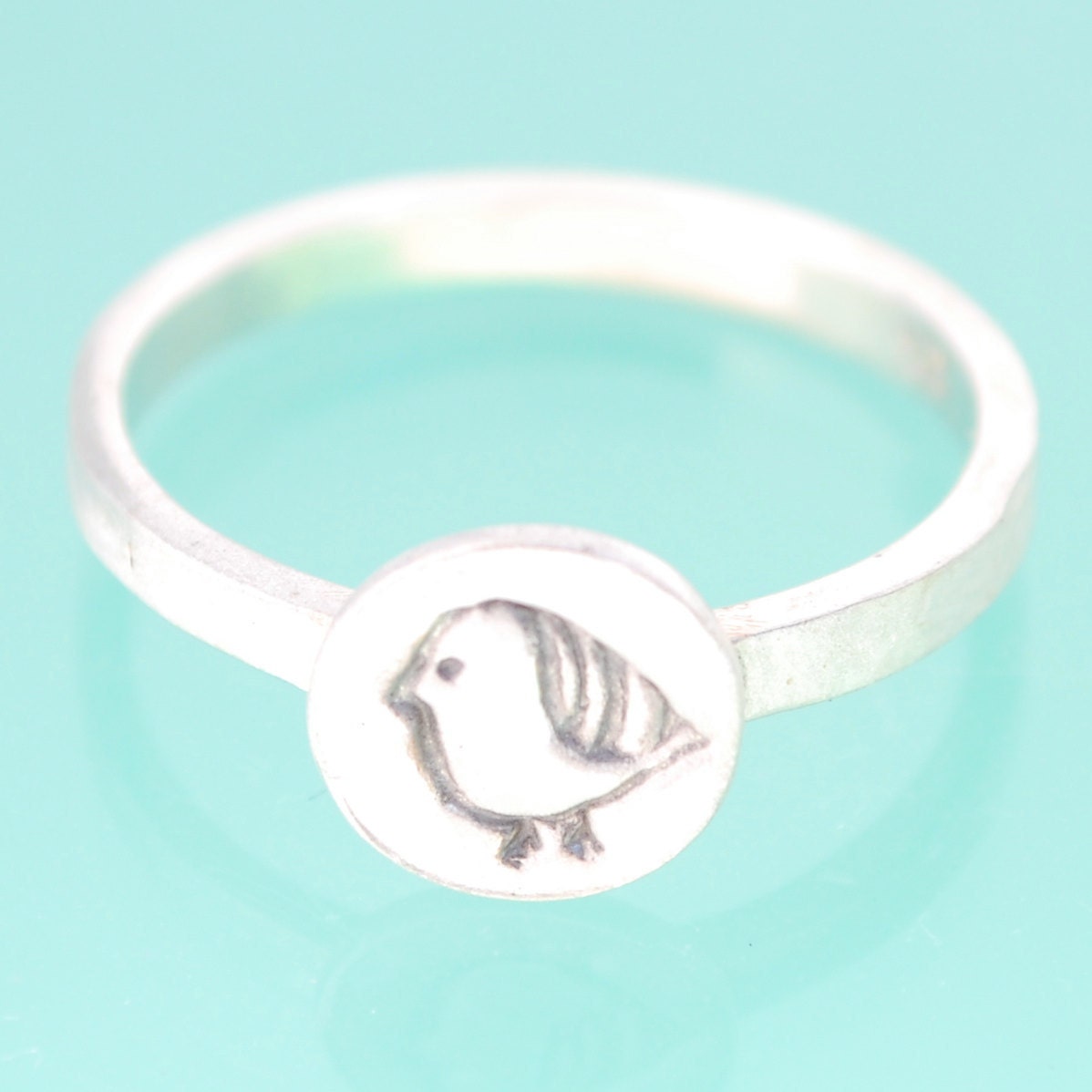 Mini BIRD ring, stacking ring featuring bird with STRIPED FEATHER, eco-friendly silver. Handcrafted by Chocolate and Steel
