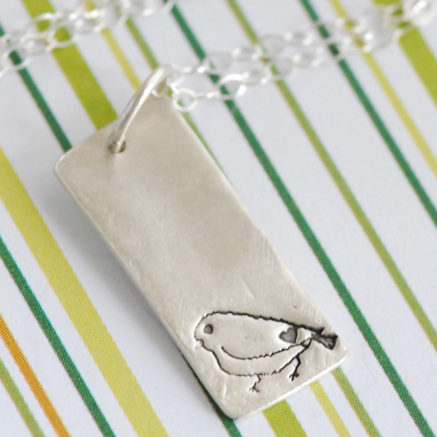 LOVE SPARROW, skinny rectangular bird pendant, eco-friendly silver.  Handcrafted by Chocolate and Steel
