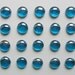 12 Glass Gems Iridescent Sky Blue in a Square Can