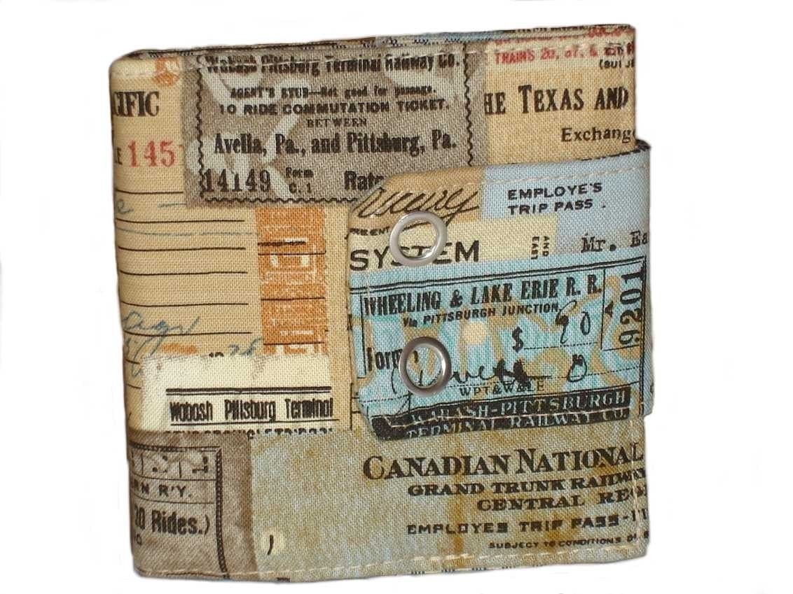 Train ticket stubs,business and creditcard catcher with zippered pocket on the inside SINGLE Snap closer. 