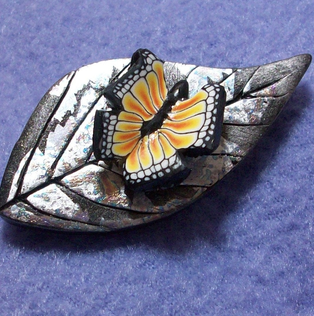 clearance was 6.95: Butterfly in flight brooch.