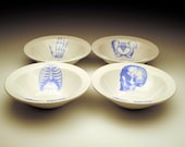 BONE APPETIT cereal bowl Set of 4 skeletal images in BLUE