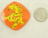Plastic Orange Dragon Pendant