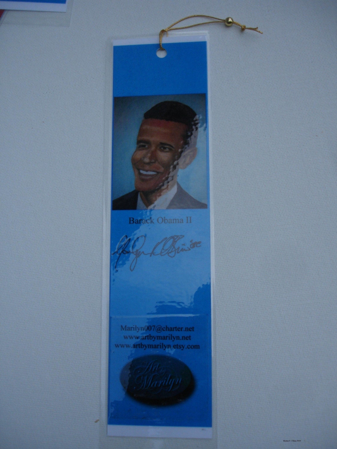 President Barack Hussein Obama II - Bookmark (Laminated and has a gold beaded wrist holder)